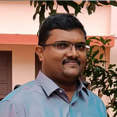 Dr. Mathew George
